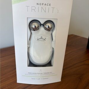 Trinity Facial Toning Device in White and Silver